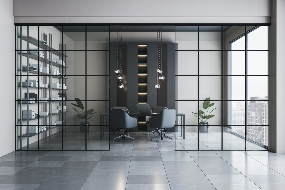 Elegant modern office interior with glass walls and city view